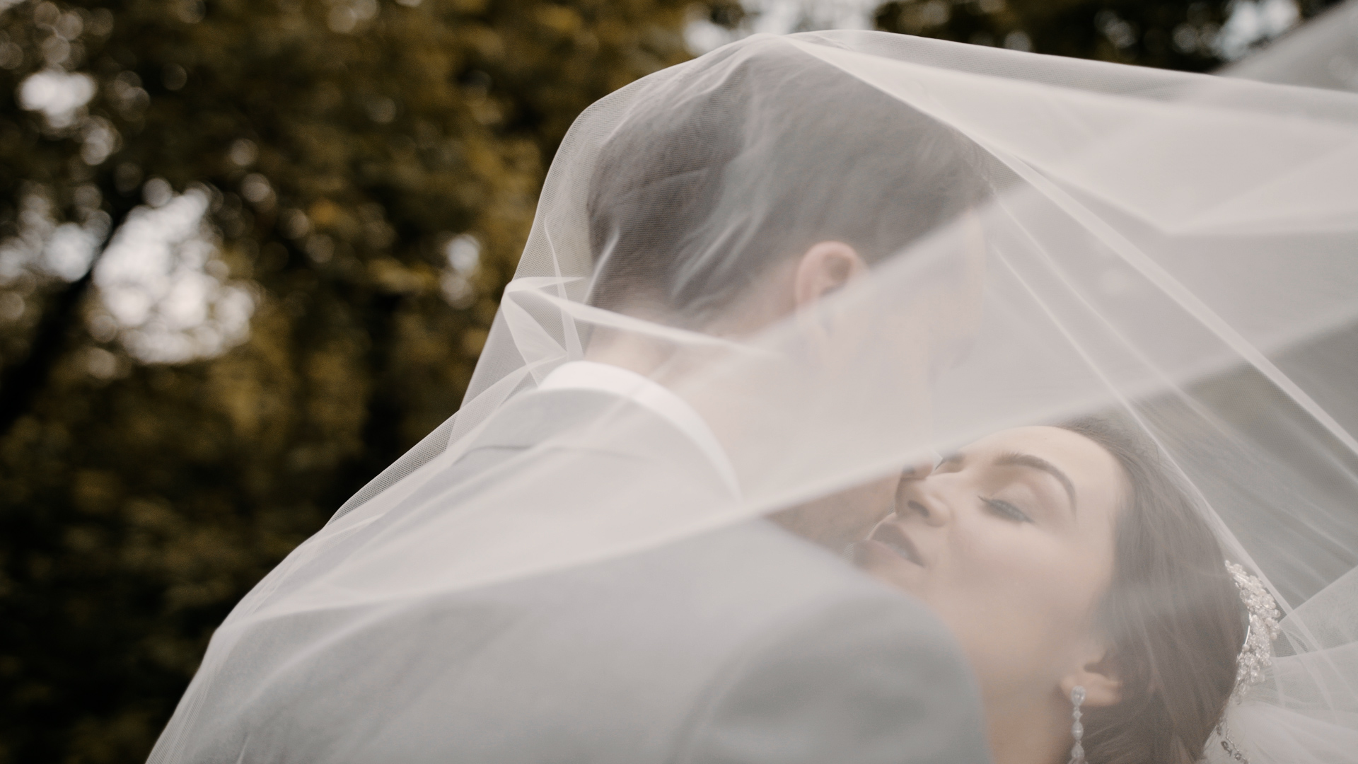 Bride and Groom Under Veil Photo at a Royal Park Hotel Wedding